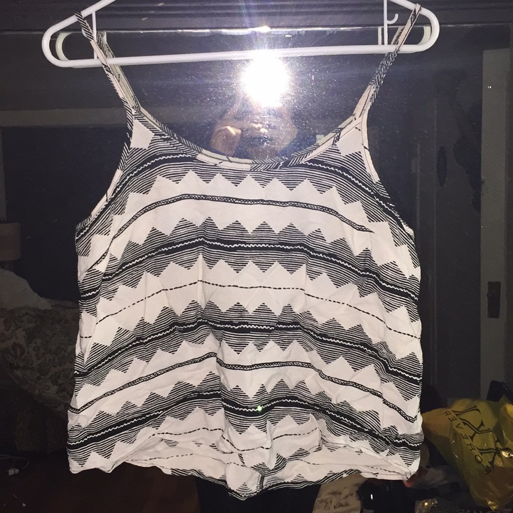 Adjustable strap tank. Open back